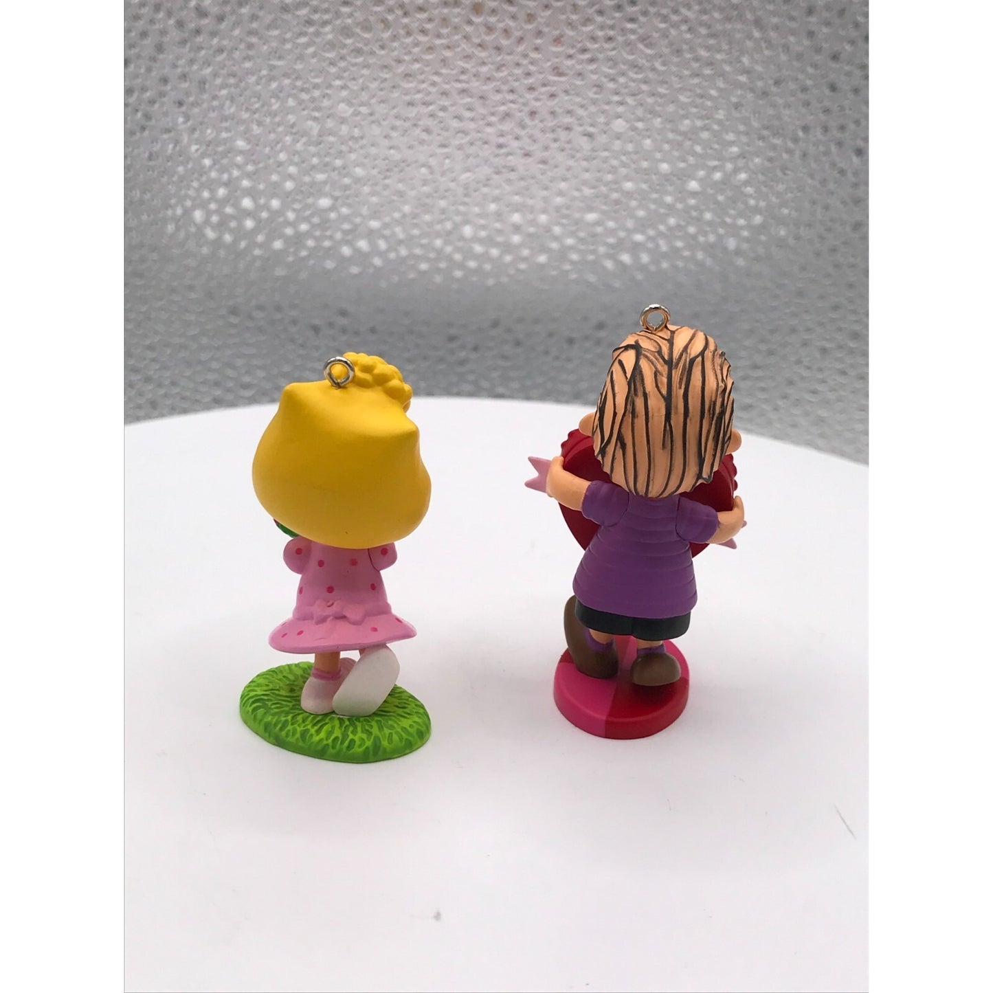 Linus and Sally from the Peanuts Hallmark Keepsake Christmas Ornaments Set of 2 out of box back side view