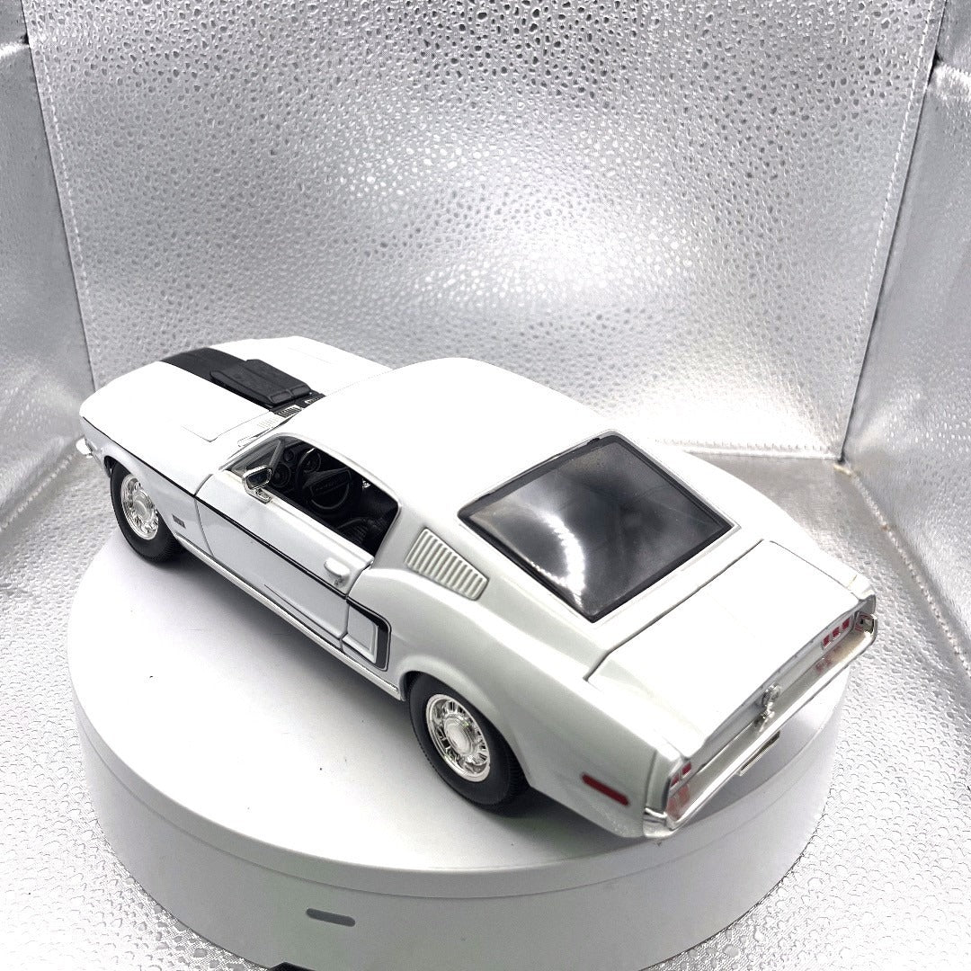 Maisto 1968 Ford Mustang GT White Die Cast, Scale: 1/18, No. 11330 drivers side/back end view