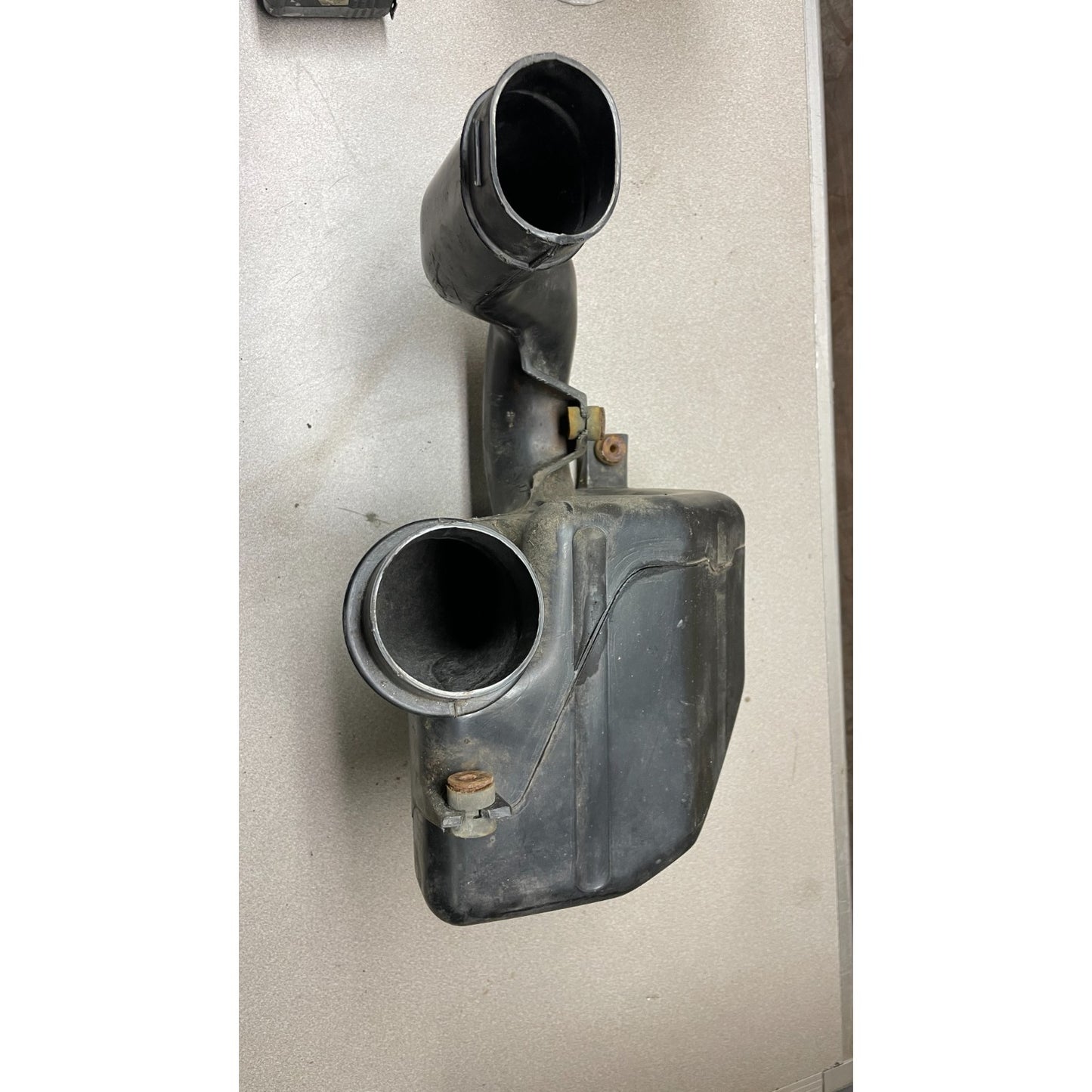 OEM Honda Civic Del Sol Intake Resonator Box front view of intake openings