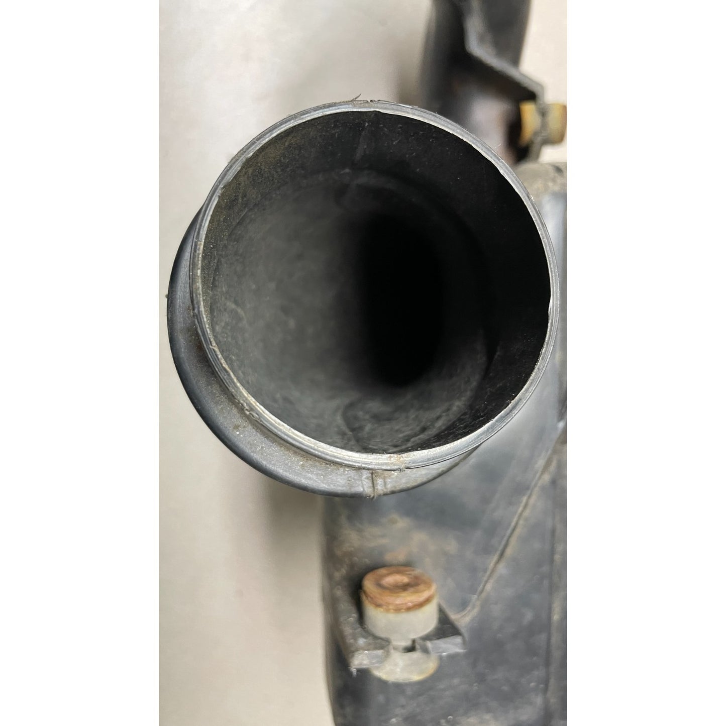 OEM Honda Civic Del Sol Intake Resonator Box closeup of intake tube