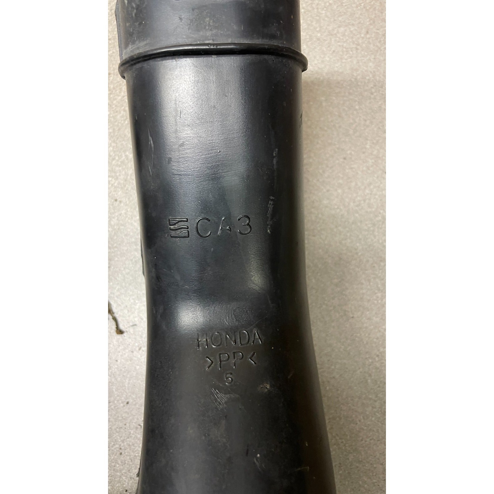 OEM Honda Civic Del Sol Intake Resonator Box closeup with product markings