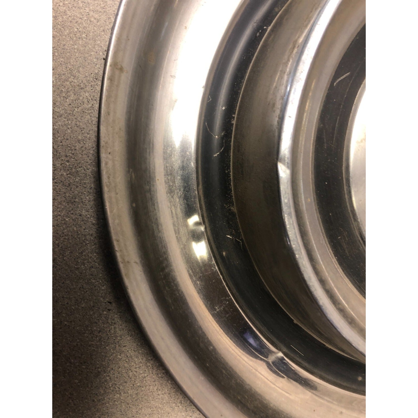 Pair 1958 Pontiac Hub Cap Wheel Cover 14in front view closeup small dent