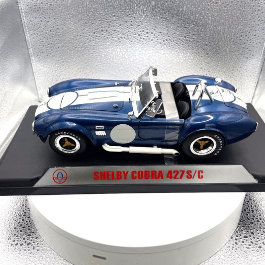 1965 Shelby Cobra 427 S/C Blue Die Cast Carroll Shelby Sig, Scale: 1/18 driver's side view