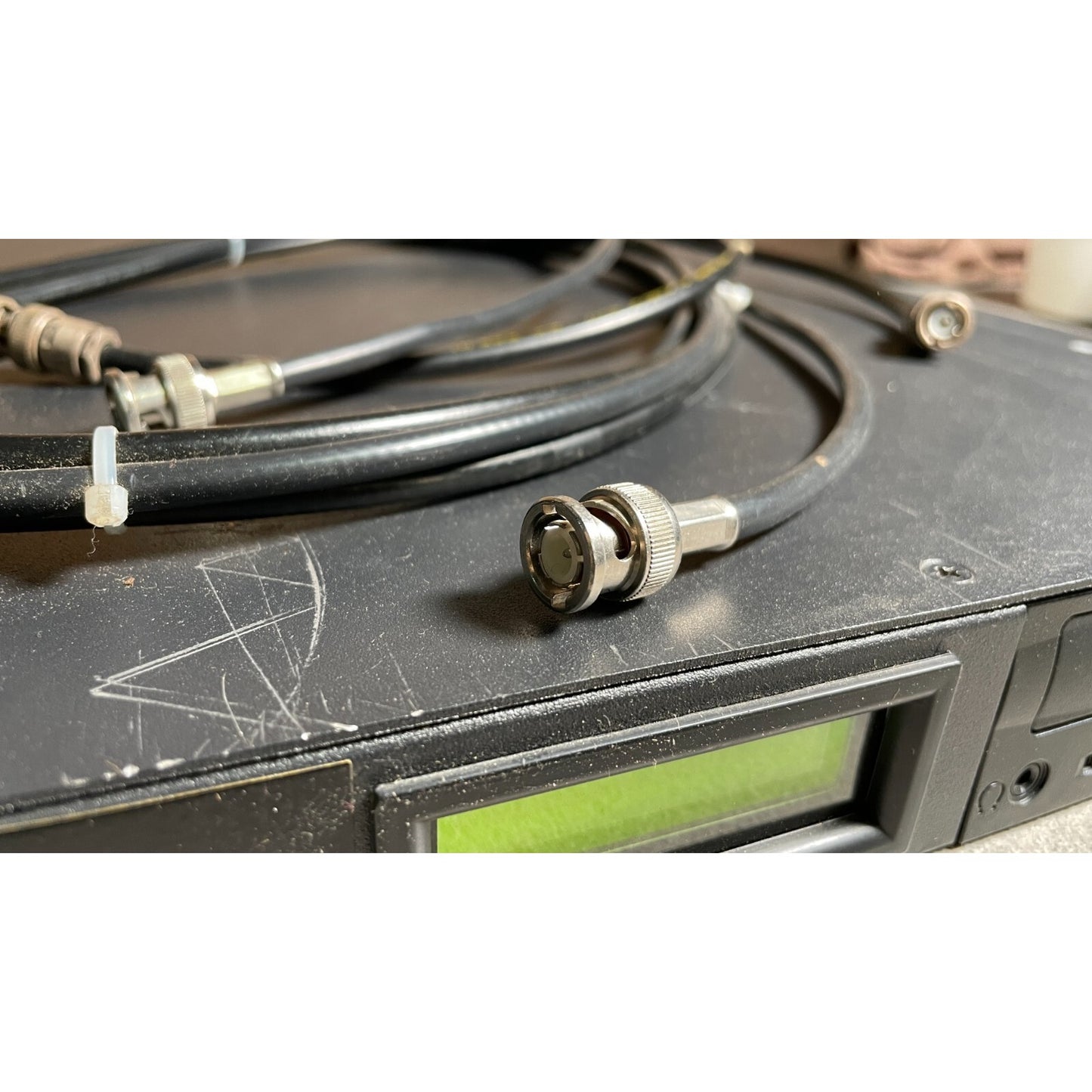 Firefly Video Player Multichannel MPEG-2, with manual top view and cable connector. top scratched