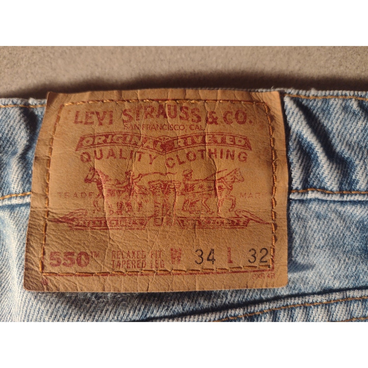 Levi's Strauss &amp; Co Light Blue Jeans Relaxed Fit Tapered Leg W34 L32 outside waistband tag W34 L32