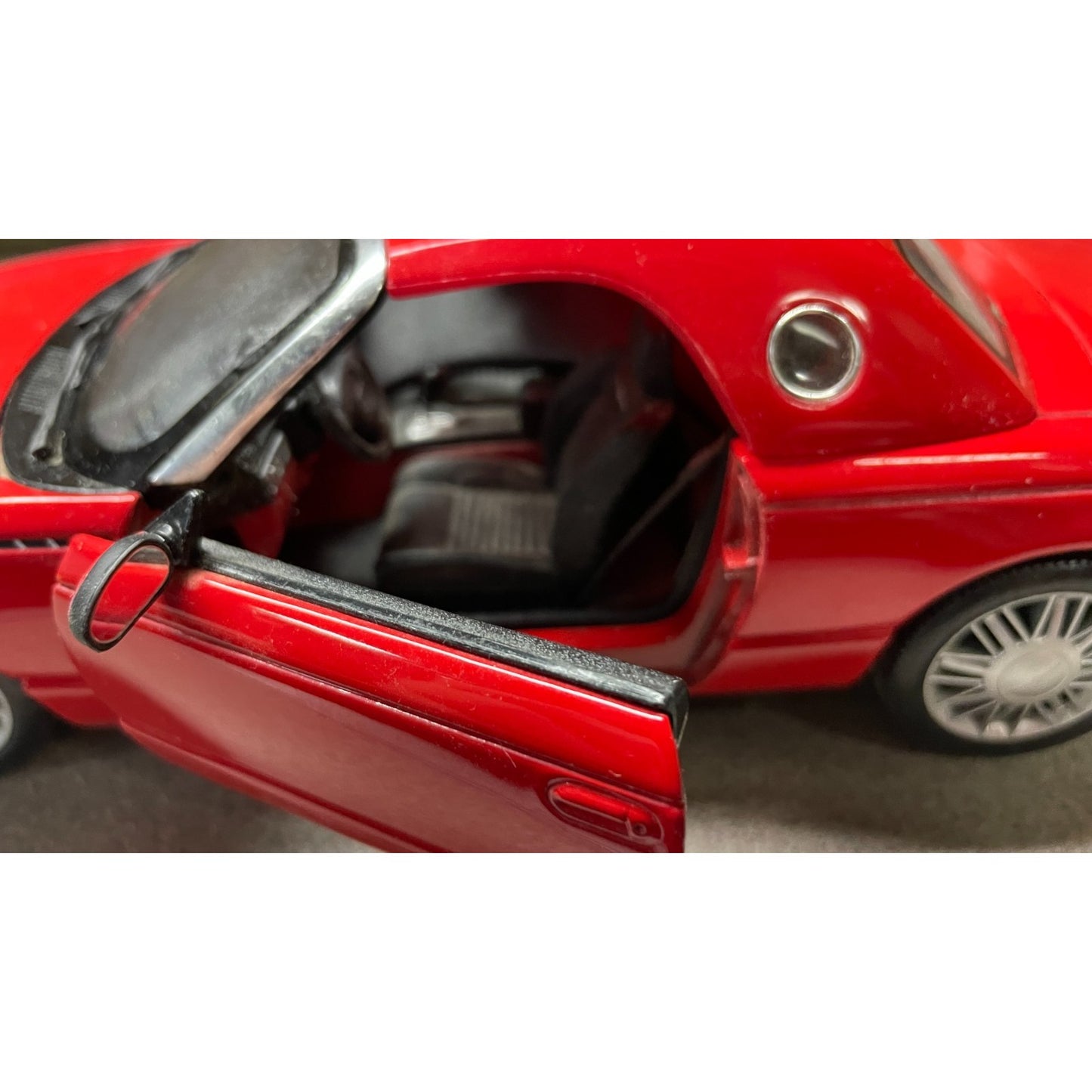 Maisto Ford Thunderbird Red Convertible Die Cast, Scale: 1/18 closeup of open drivers door