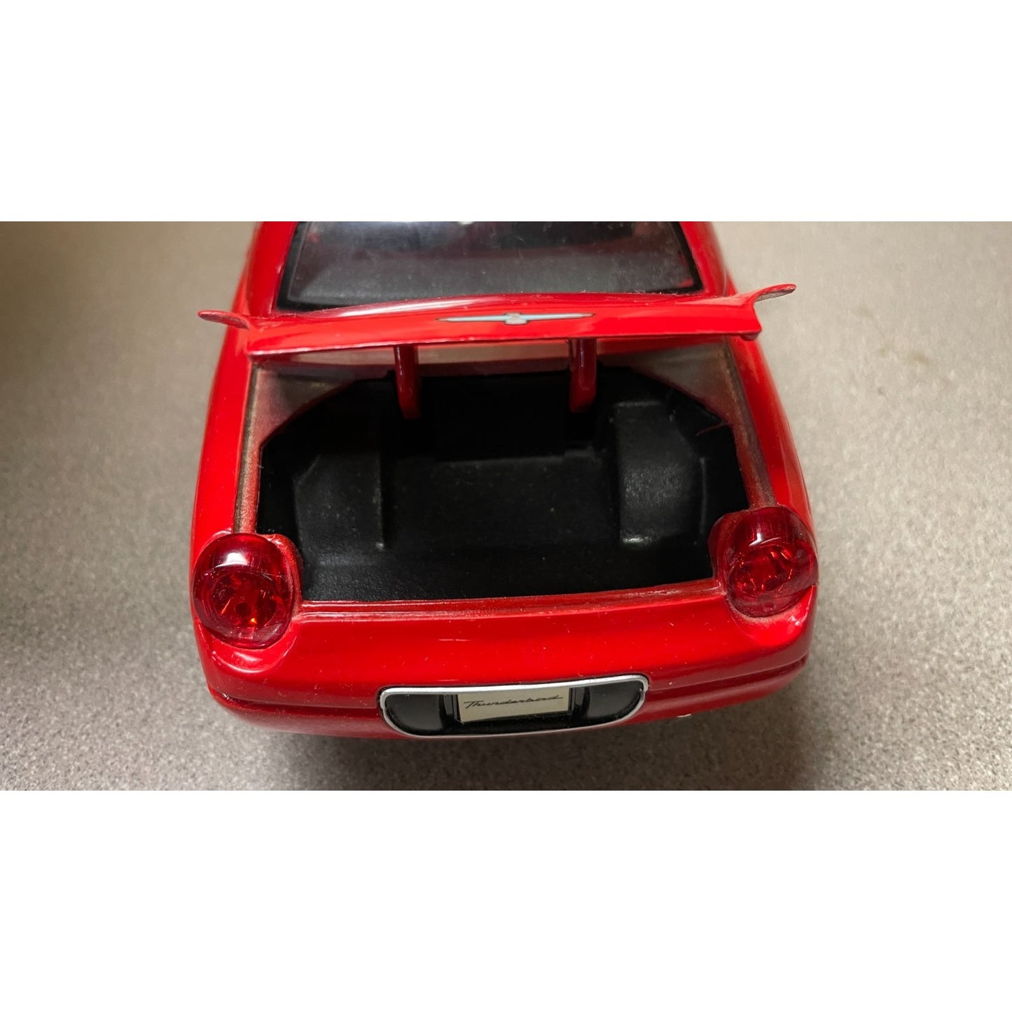 Maisto Ford Thunderbird Red Convertible Die Cast, Scale: 1/18 close-up of open trunk