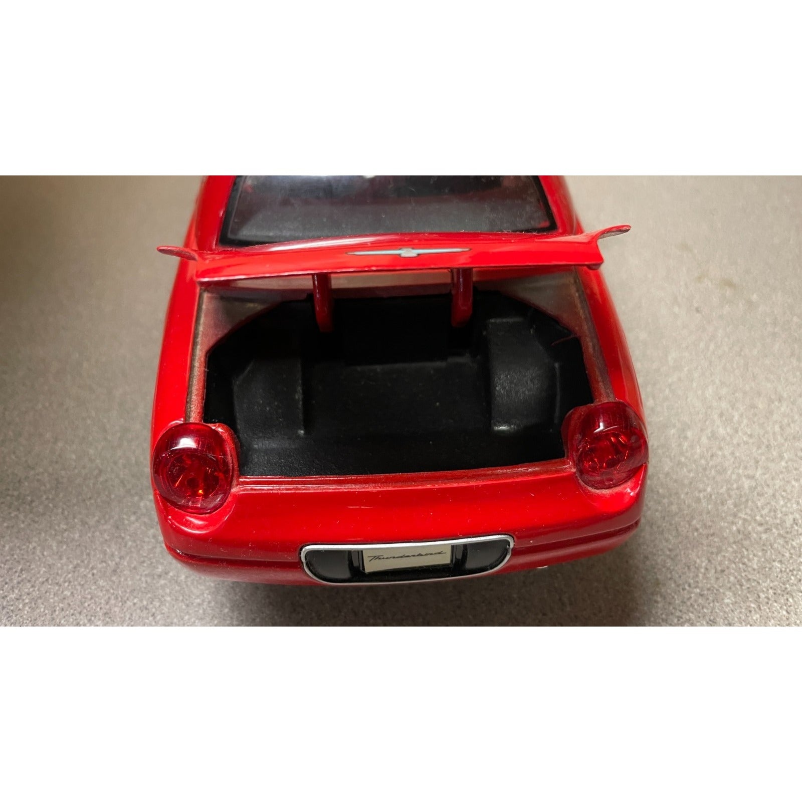 Maisto Ford Thunderbird Red Convertible Die Cast, Scale: 1/18 close-up of open trunk