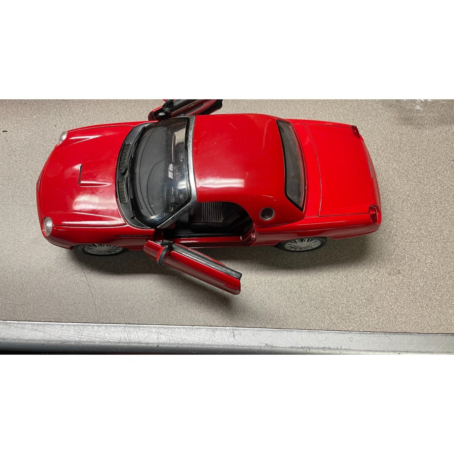 Maisto Ford Thunderbird Red Convertible Die Cast, Scale: 1/18 overhead view with doors open