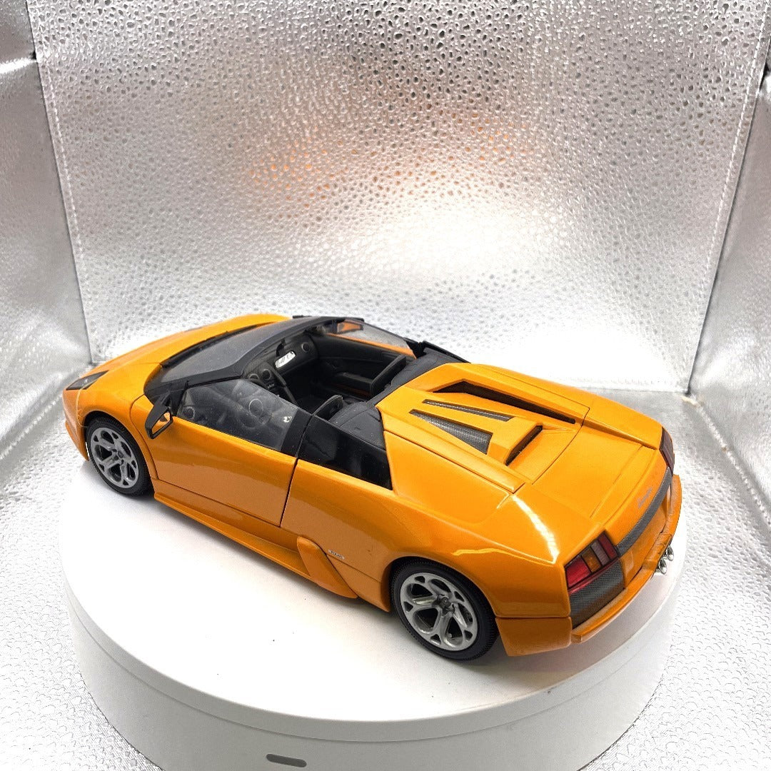Motor Max Lamborghini Murciélago Roadster Orange Die Cast, Scale: 1/18, No. 73169 drivers side/back end view