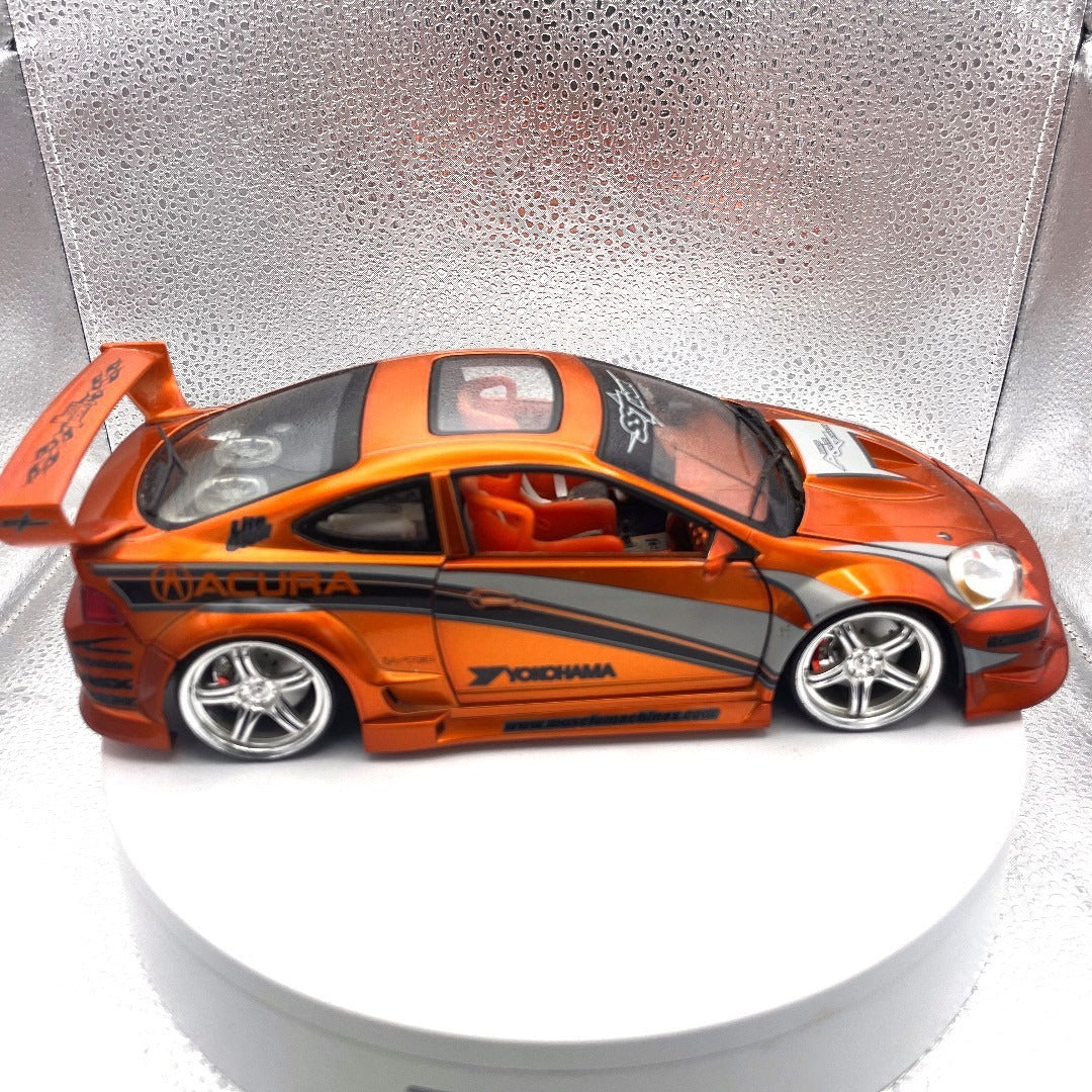 Muscle Machines 2002 Acura RSX Orange Die Cast, 1:18 Scale passenger side view
