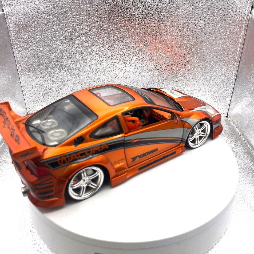 Muscle Machines 2002 Acura RSX Orange Die Cast, 1:18 Scale passenger side view