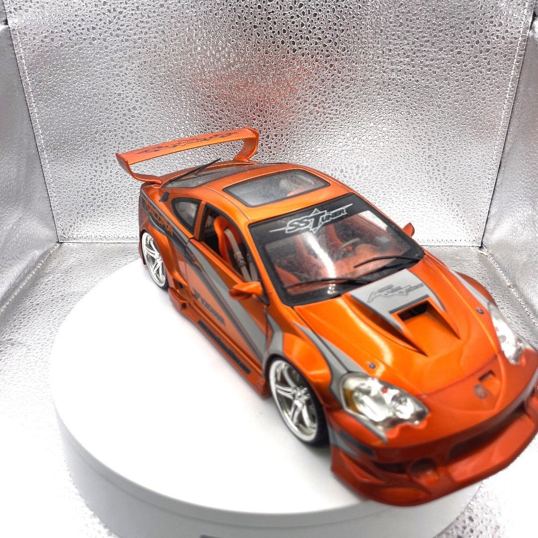 Muscle Machines 2002 Acura RSX Orange Die Cast, 1:18 Scale passenger/front end view