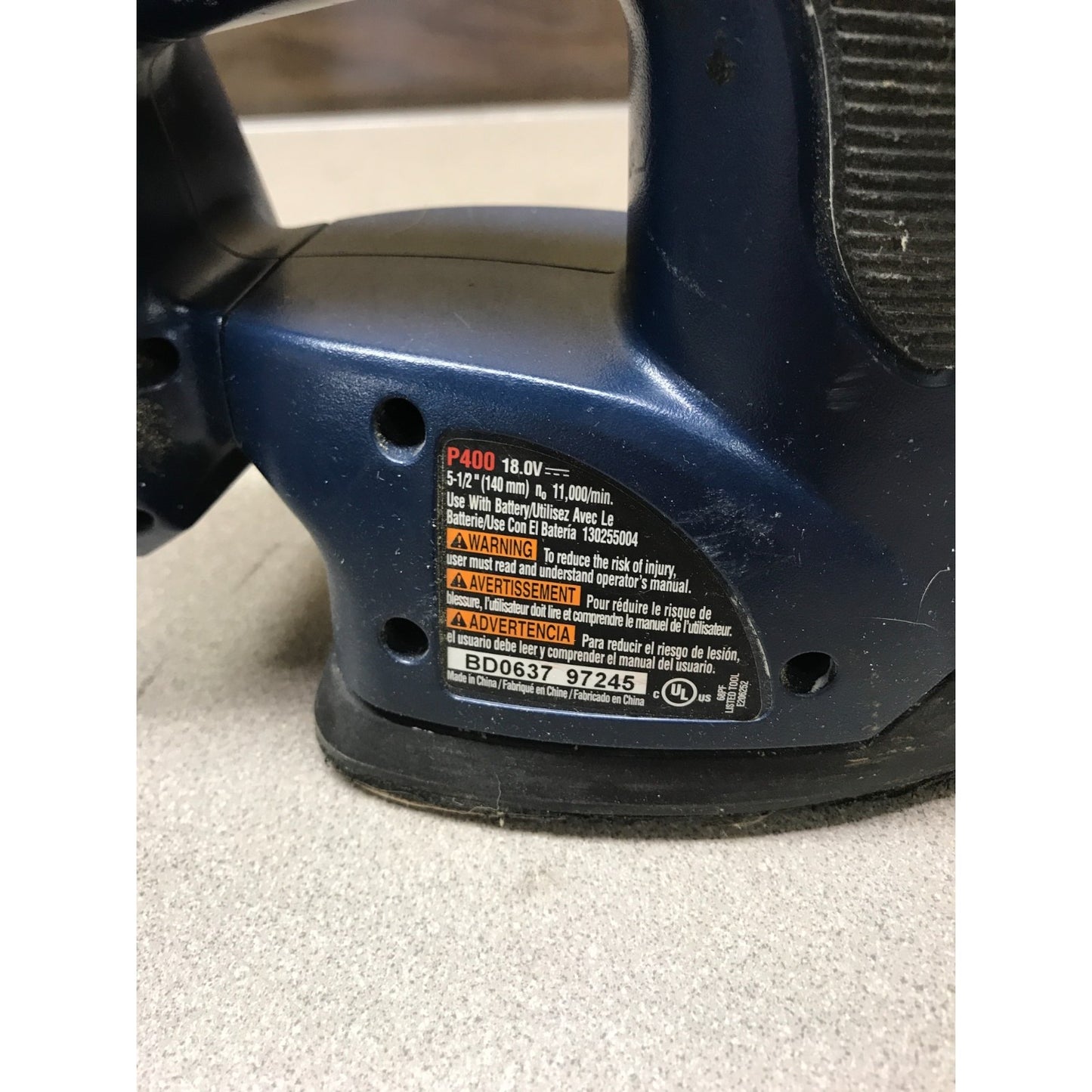 RYOBI P400 Handheld Sander, 18v. closeup of sander product label