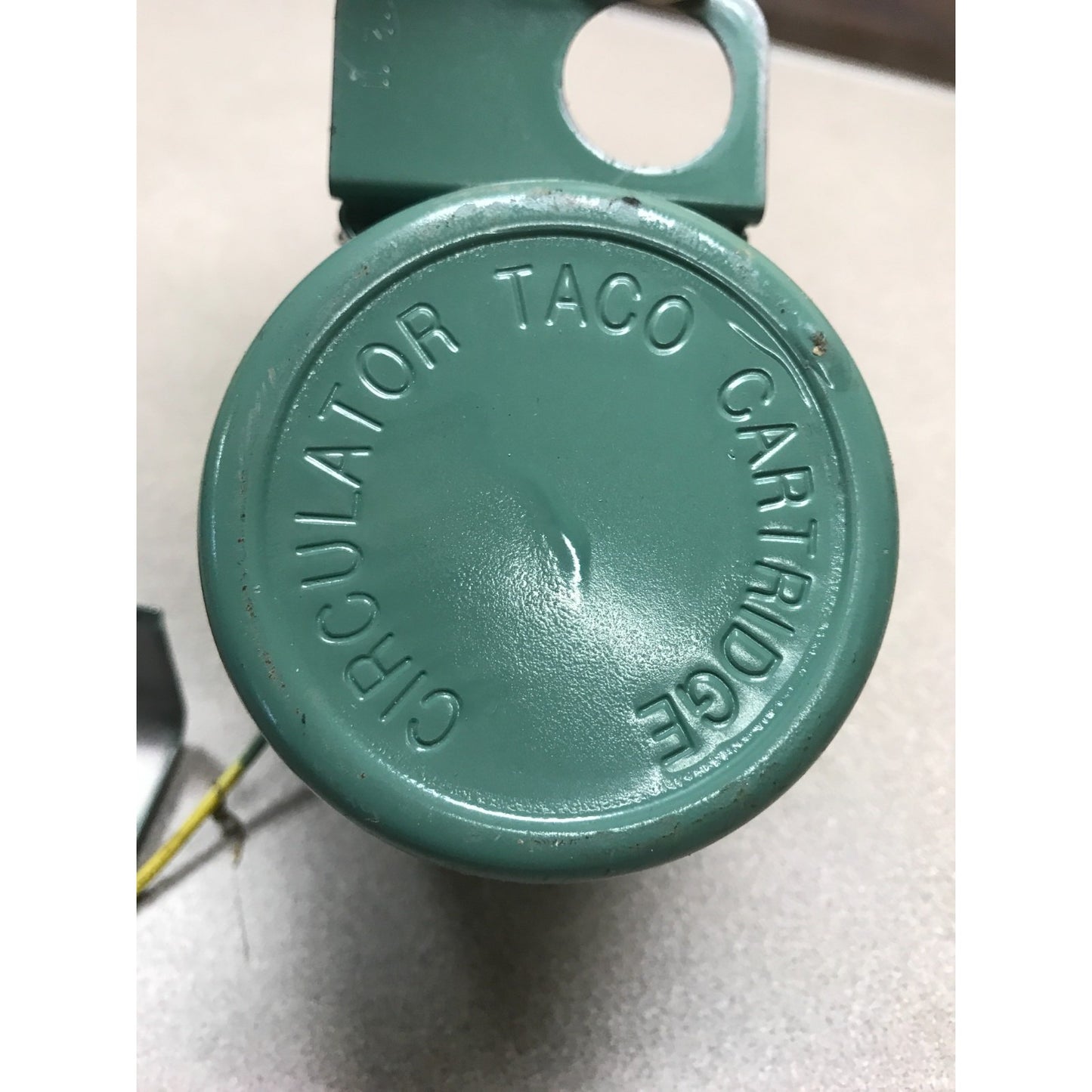 TACO 007-F5 Cast Iron Cartridge Circulator bottom view with  Taco stamp