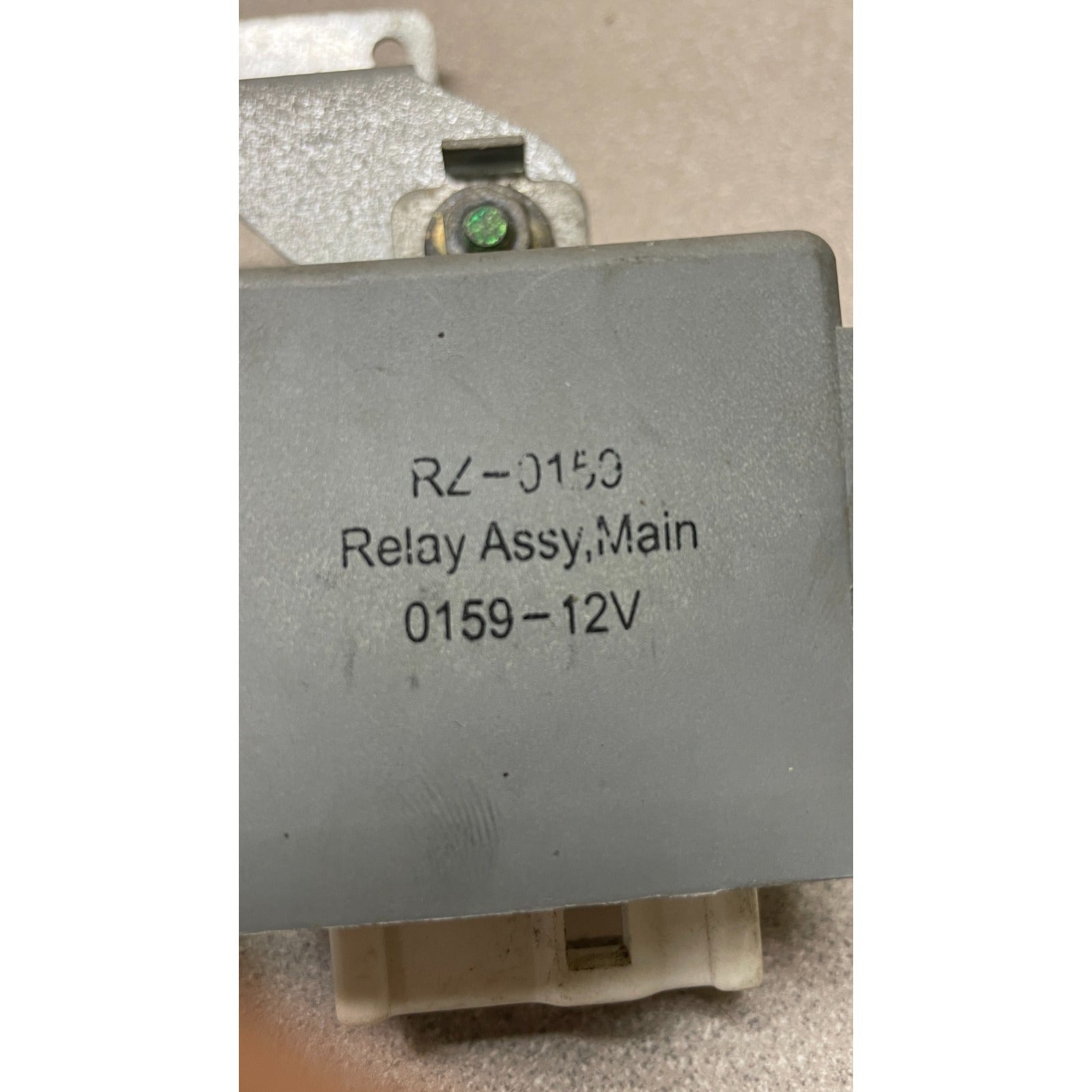 Relay assembly labeled RZ-0159 on a beige background