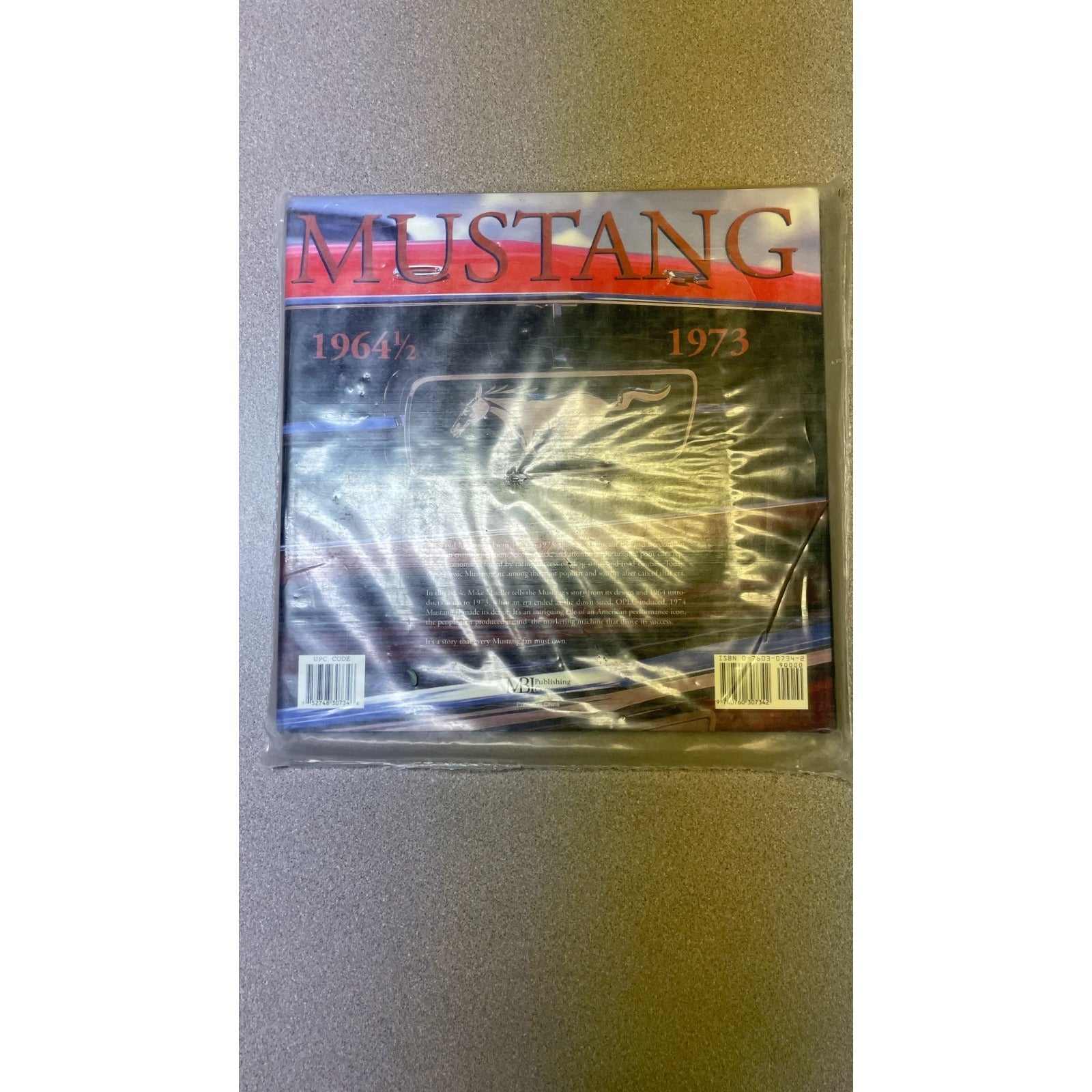 Mustang 1964 1/2 - 1973 Hardcover Book, Mike Mueller ISBN 0-7603-0734-2 back of book in plastic packaging
