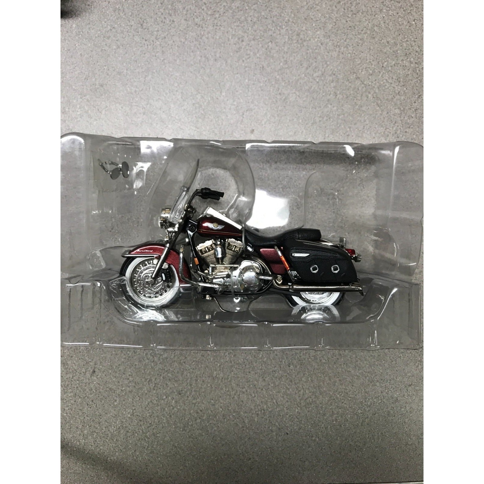 Maisto Harley Davidson Die Cast Lot of 8, 6 Brand New In Plastic closeup of motorcycle in plastic case