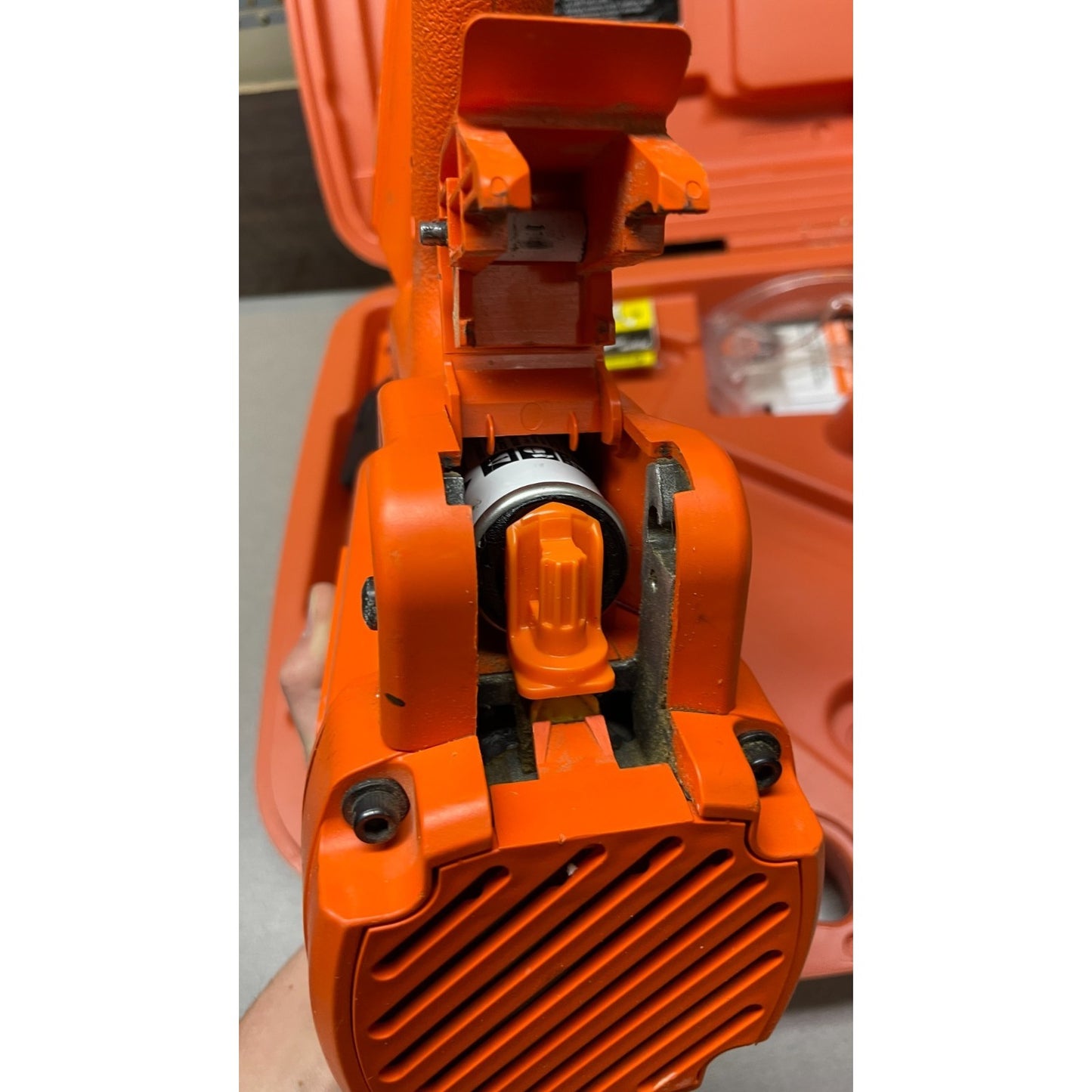 Paslode Impulse IM250 II Cordless 16 gauge Straight Finish Nailer 900400, Untested, Includes Case and Accessories closeup of bottom