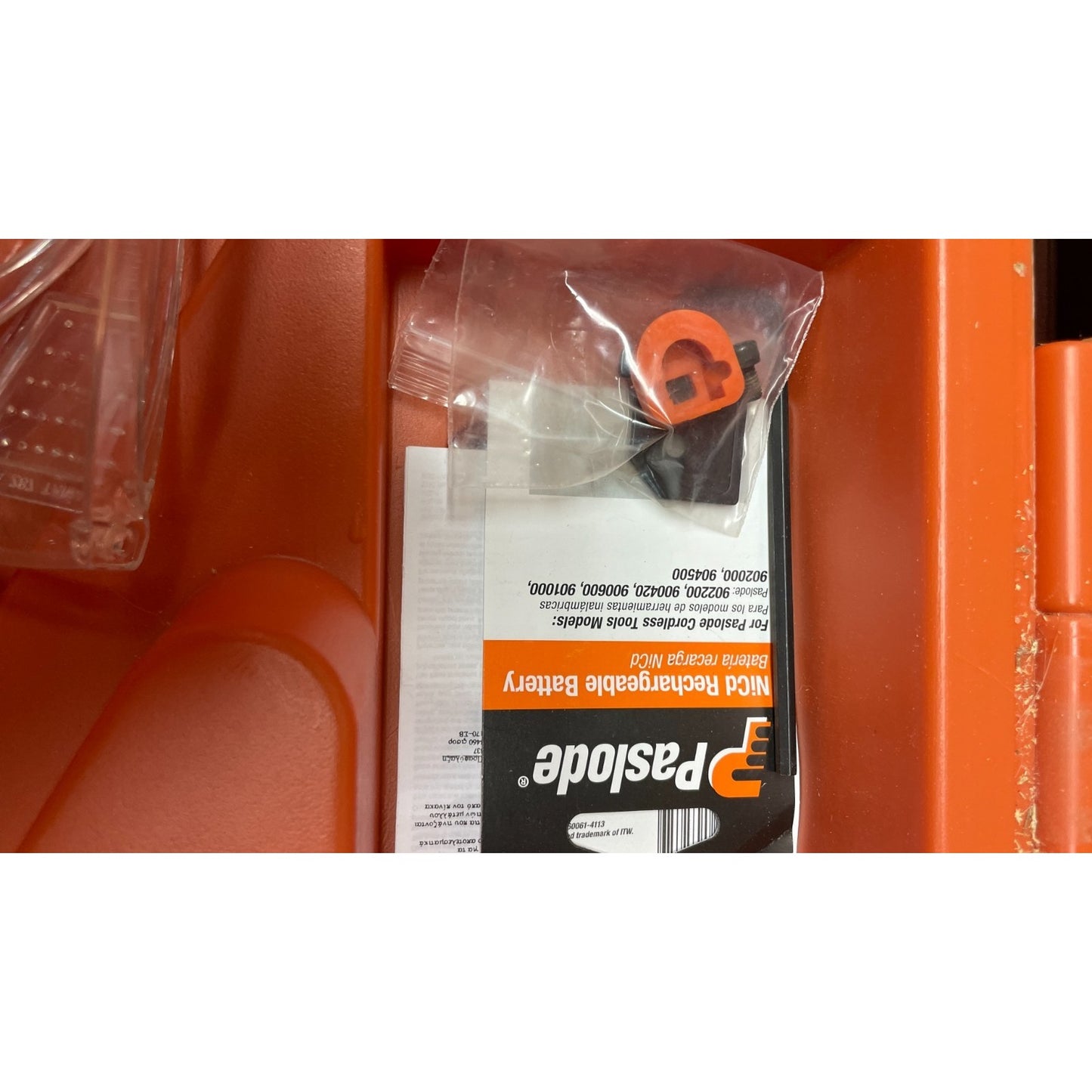 Paslode Impulse IM250 II Cordless 16 gauge Straight Finish Nailer 900400, Untested, Includes Case and Accessories closeup of accessory and documentation in case