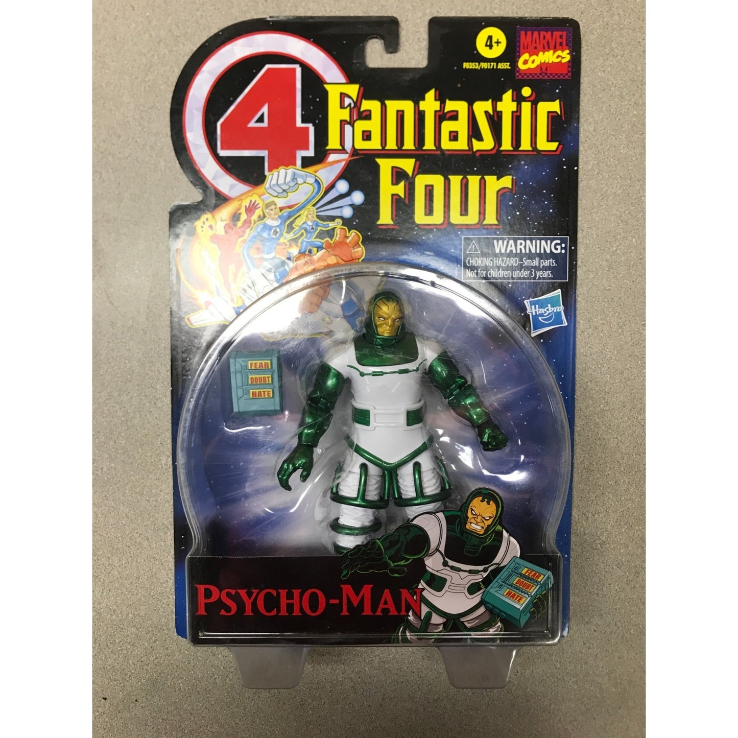 Vintage Marvel Comics 4 Fantastic Four Psycho-Man action figure in original blister card packaging, featuring green and white suit details against a dark blue space-themed background.