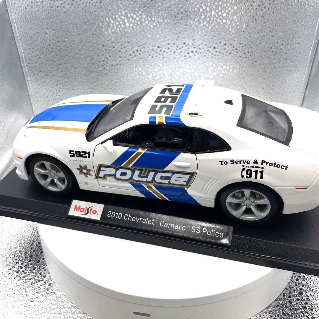 Maisto 2010 Chevrolet Camaro White Police Die Cast with Base, Scale: 1/18 11336 driver's side view