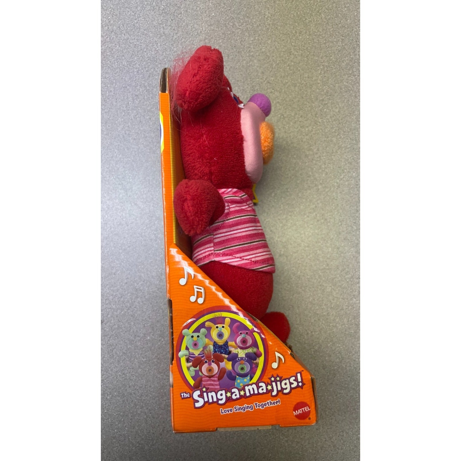 Mattel V6419 The Sing-a-ma-jings! side view of item in packaging