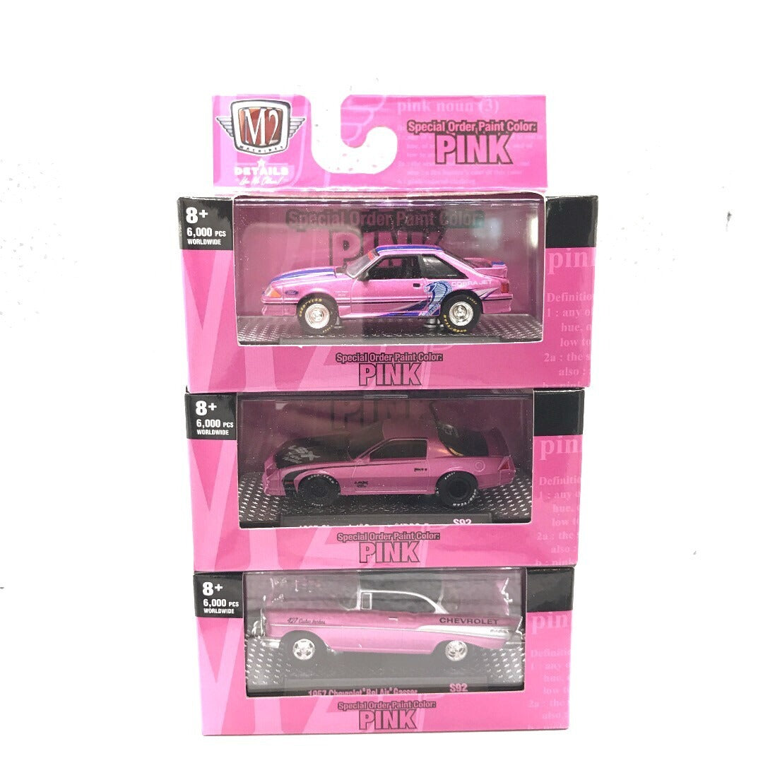 M2 Pink Cars Set of 3 - Includes 1985 Chevrolet Camaro IROC-Z, 1957 Chevrolet Bel Air Gasser, and 1987 Ford Mustang GT - Custom front view of all 3 in package