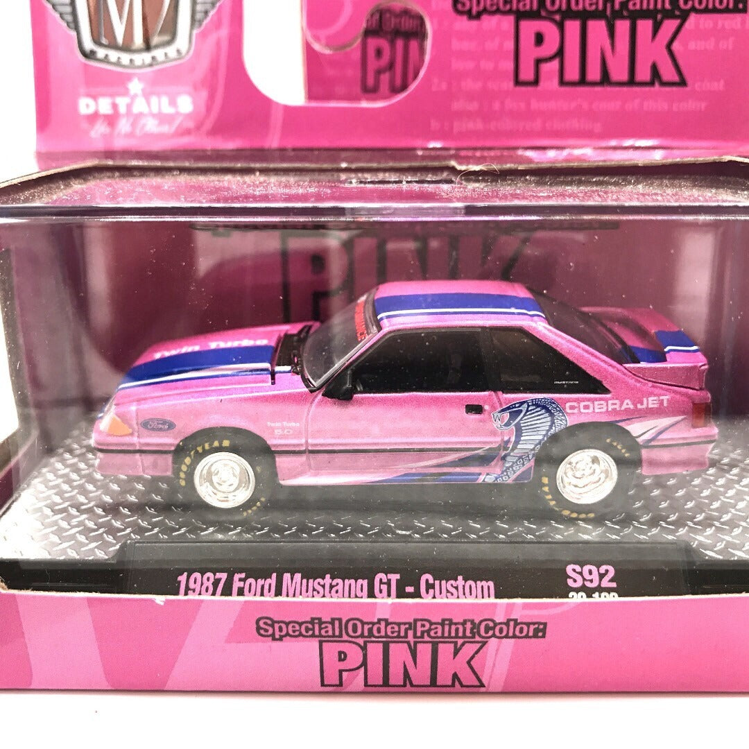 M2 Pink Cars Set of 3 - Includes 1985 Chevrolet Camaro IROC-Z, 1957 Chevrolet Bel Air Gasser, and 1987 Ford Mustang GT - Custom view in package