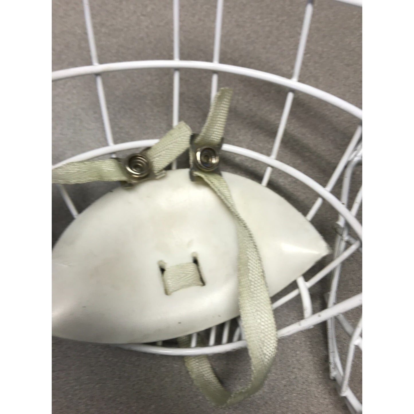 Two Hockey Cage Masks White Metal 7.5 inch (one with chin pad) chin pad closeup