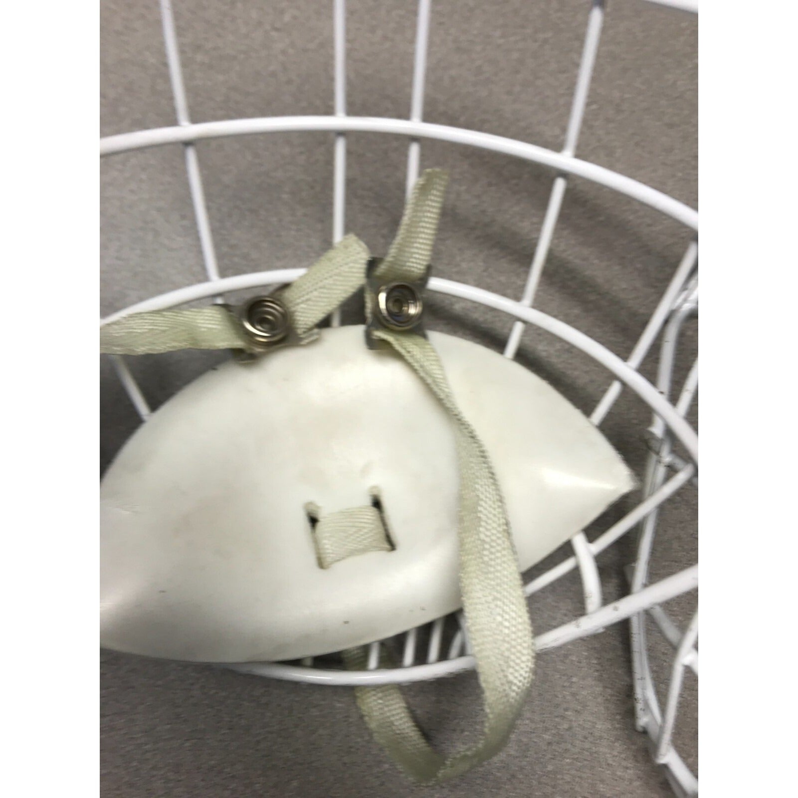 Two Hockey Cage Masks White Metal 7.5 inch (one with chin pad) chin pad closeup
