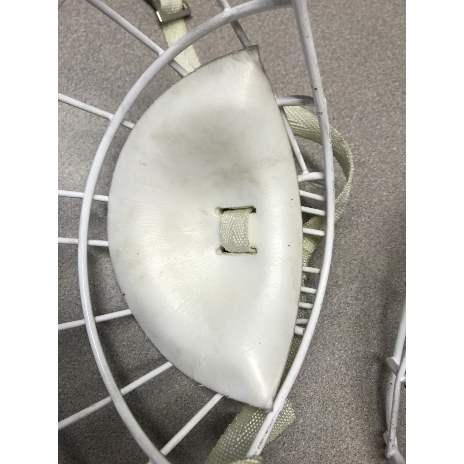 Two Hockey Cage Masks White Metal 7.5 inch (one with chin pad) inside chin pad view