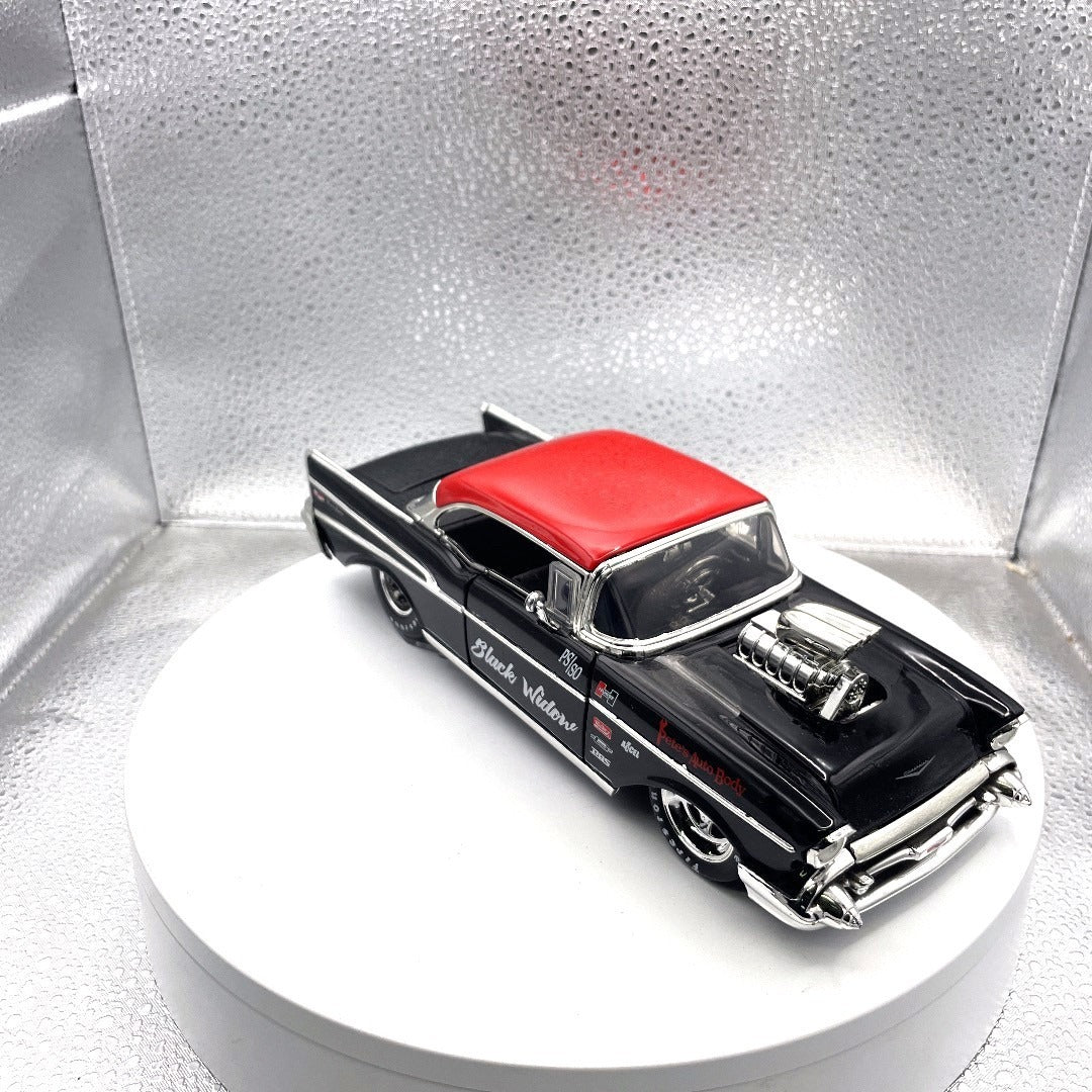 Jada Toys 1957 Chevy Bel Air Black Drag Car, Scale: 1/24, No. 30533, Big Pete Black Widow passenger/front end view