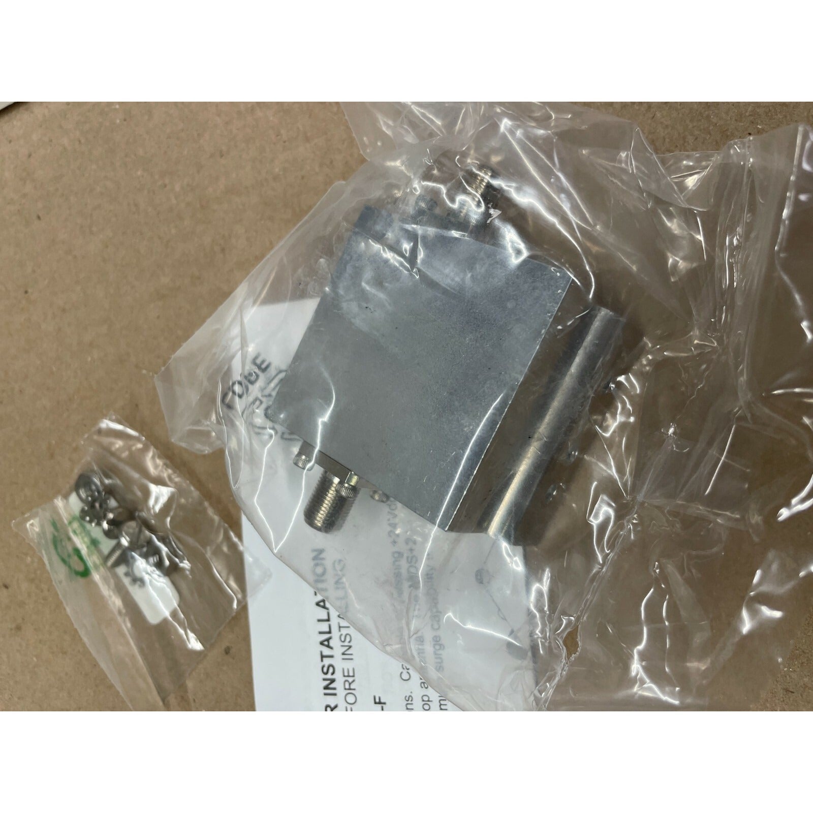 PolyPhaser Equipment +24VDC Pass 75 Ohms Coax Protector @50W back side in packaging